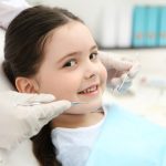 Child receiving a routine dental checkup from a pediatric dentist in Gorakhpur